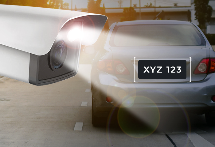 License Plate Recognition in Action - LPR camera capturing and identifying vehicle license plate XYZ 123 with real-time recognition overlay